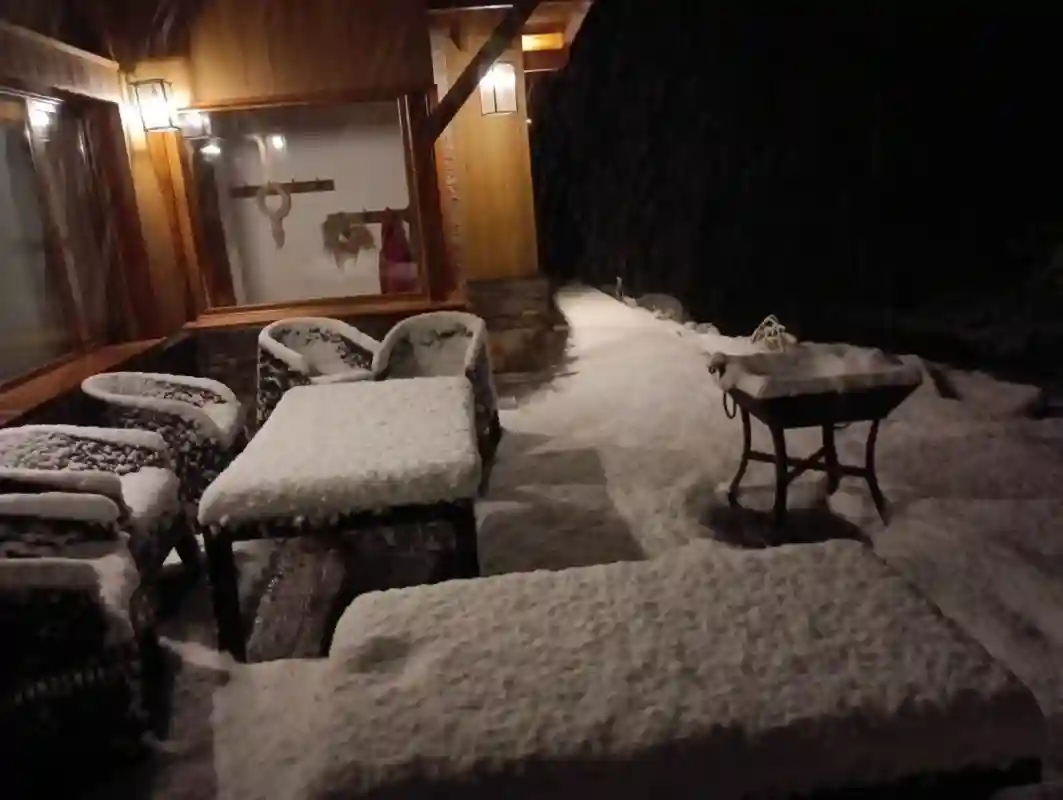 Snowy deck at night