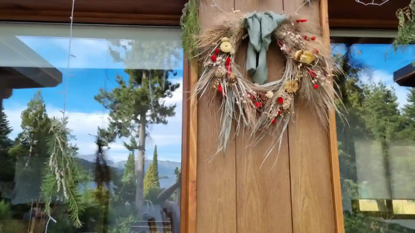 Wicker Christmas Wreath in front of the house