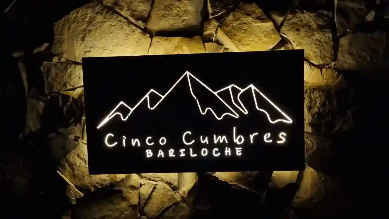 Illuminated sign at the entrance to Cinco Cumbres